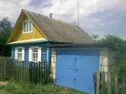 Двухэтажная дача с гаражом